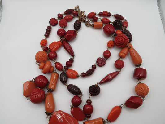 Vintage Carved Celluloid Coral Triple Strand Statement Necklace
