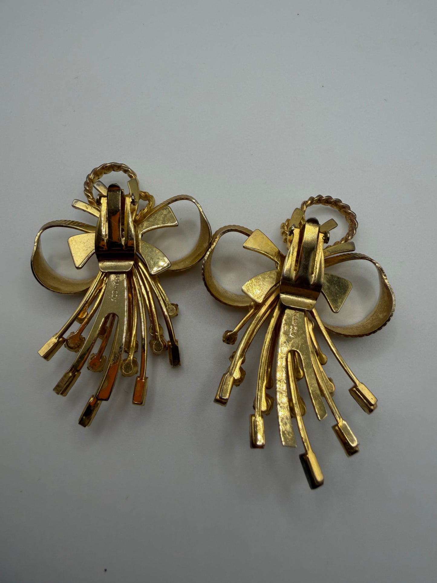 Vintage Sarah Coventry Retro Rhinestone Spray Bow Clip On Earrings