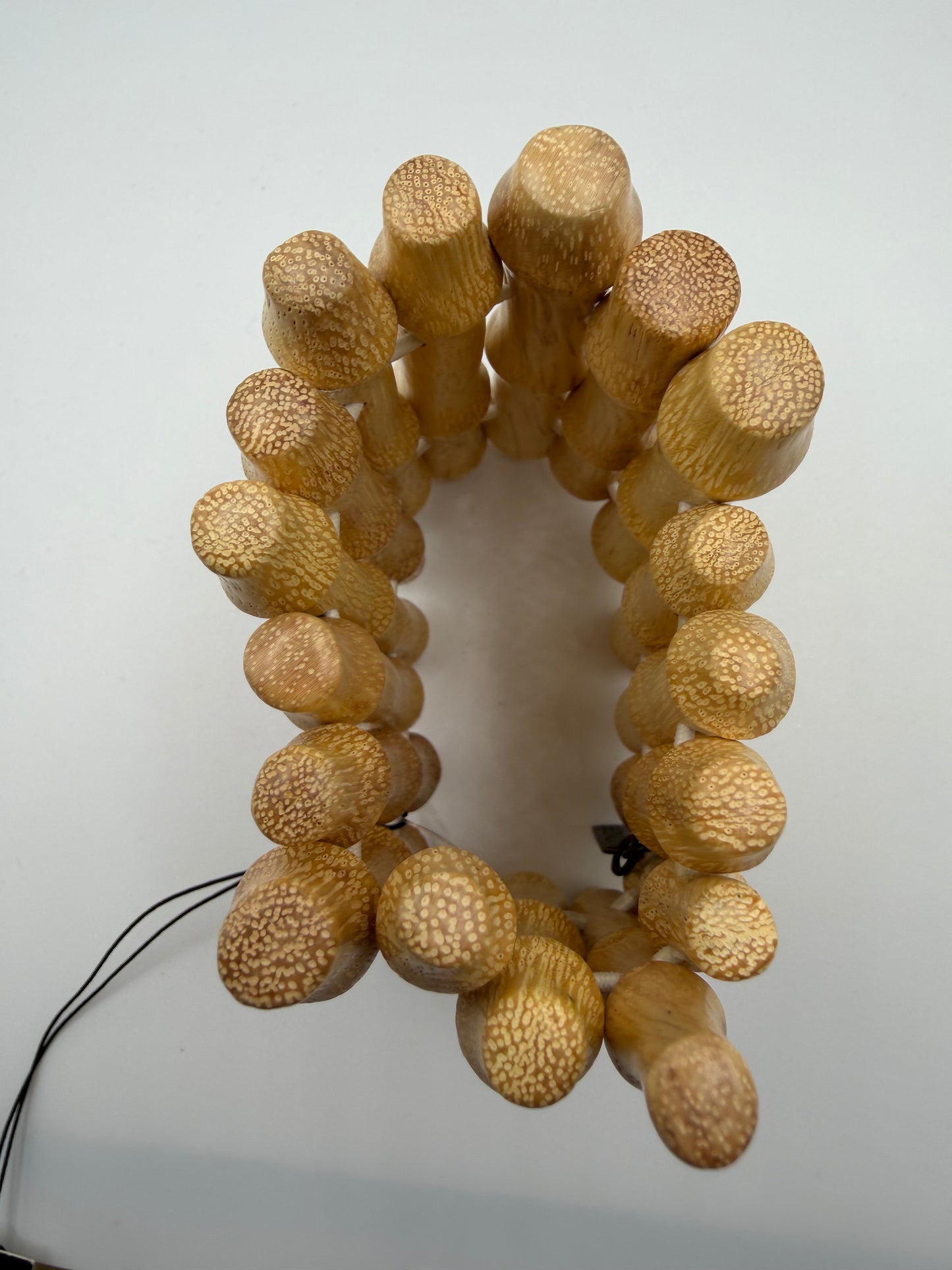 Iris Apfel's Vintage Monies Supersized Wood Bracelet